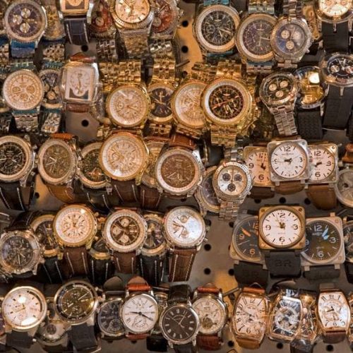 .Cons and of counterfeit watches