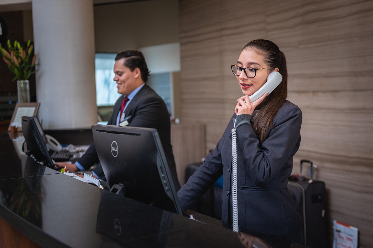 Receptionists, phone call, hotel — Allan Boomer: From Solo Founder to Visionary Leader in Financial Services