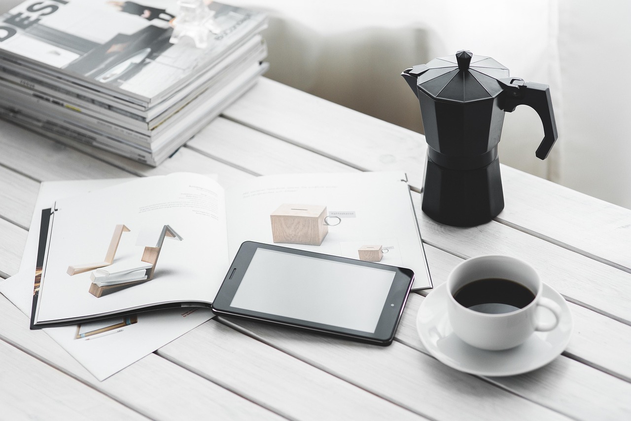 Technology, coffee cup, tablet — Top-rated Business Lawyers in Glendale